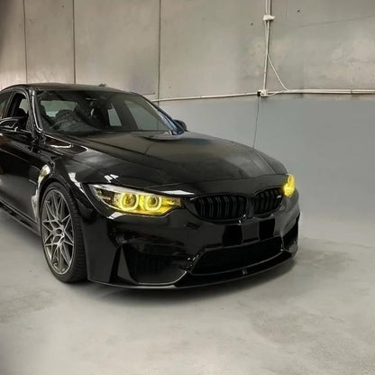 Black BMW car in a studio setting with a gray background